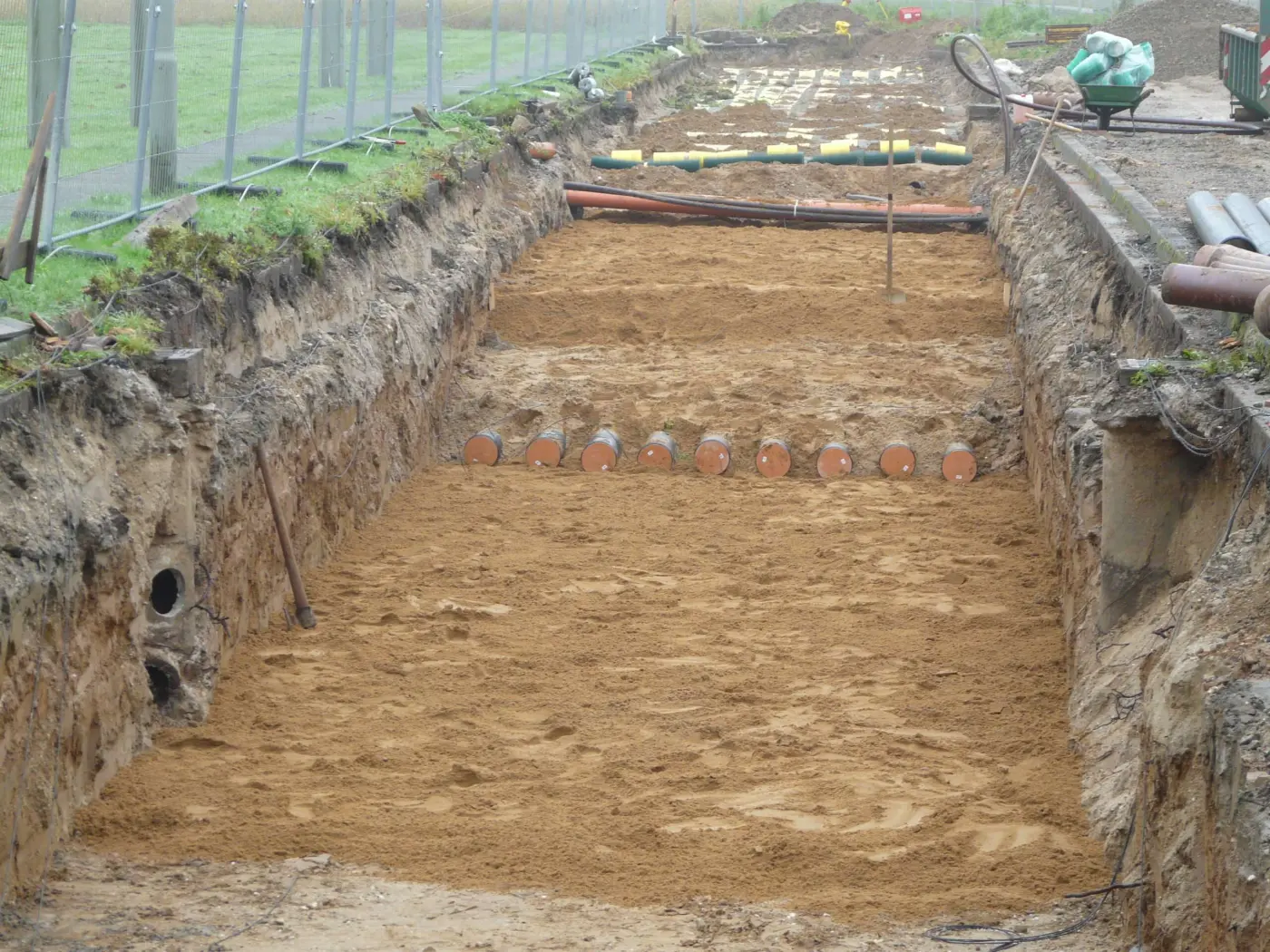 Einsanden erster Bettungsmaterialabschnitt Sand